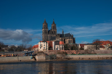 Magnificent Cathedral of Magdeburg at river Elbe with blue sky,