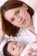 Young happy mother with baby