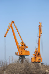 River port dock obsolate industrial yellow cranes