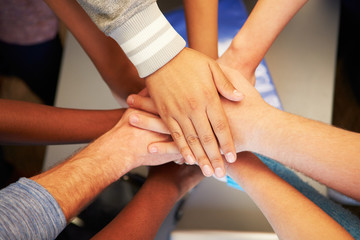 Hands From Young People Of Different Races Joined Together