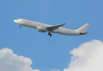 Fototapeta na wymiar Commercial Airplane flying in the sky