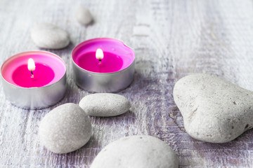 Obraz na płótnie Canvas Spa concept stones aromatic candles