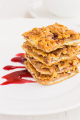 Slices of delicious fresh baked  apple cake on a wooden surface