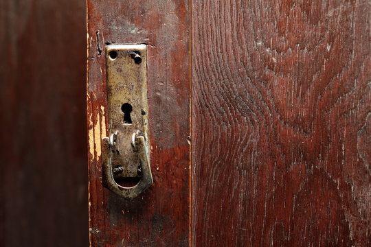 Old Door With Handles And Locks