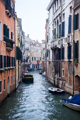 Venice. Italy. Narrow street - the channel.