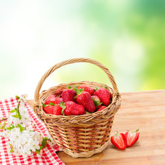 Fototapeta na wymiar Strawberries In Wicker Basket