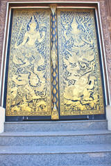 Traditional Thai style art gold painting pattern on the door