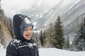 Fototapeta na wymiar Happy Child in Wintertime