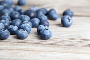 Fresh Blueberries on wooden Background