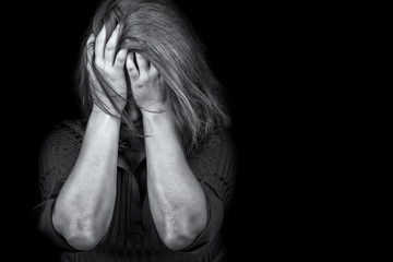 Young woman crying depression violence - 61785603