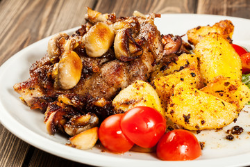 Fried pork chop with mushrooms and chips