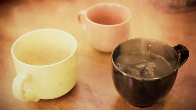 Three cups hot water one tea antique