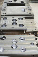 Punch press tooling. Steel detail of lathe and milling industry.
