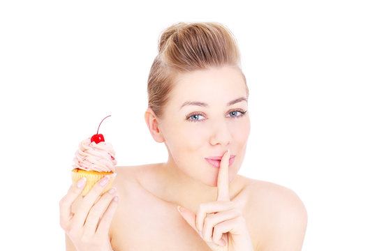 Woman Eating Cupcake In Secret