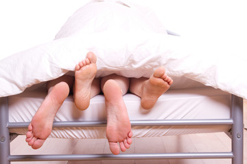 füßeln im Bett