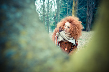 young beautiful red curly hair woman
