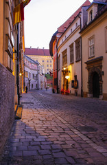 City center by night: ancient tenements, Kanonicza Street