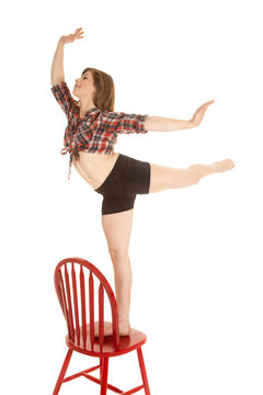 cowgril plaid shirt red chair stand on