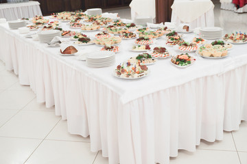 dishes and food on the served table