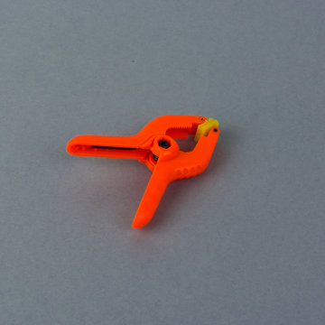 Orange plastic clamp