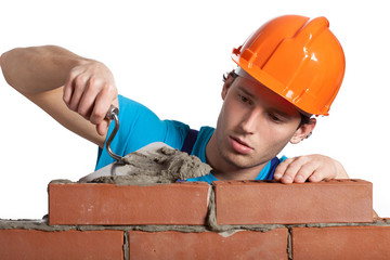 Concentrated bricklayer putting