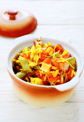 rice with vegetables in a pot