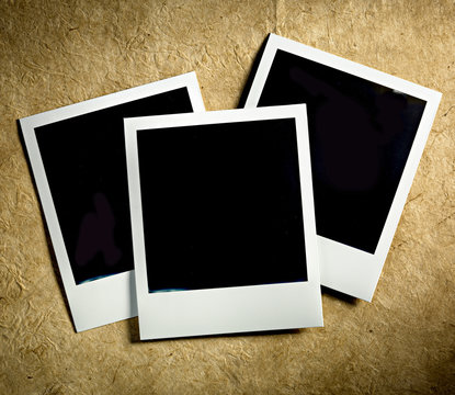 Old Polaroid Film Vintage empty photo cards on paper background