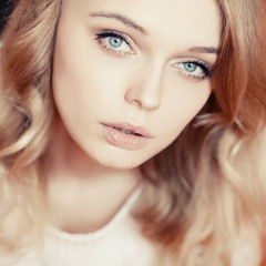 Obraz premium photograph of a beautiful young woman with a sexy look