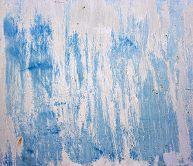 Blue abstract background. Old metallic plate with paint.