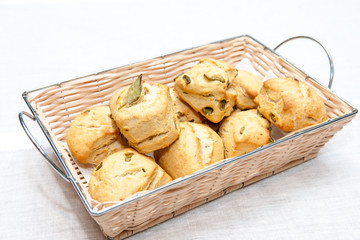 Crusty bread rolls with fresh green pepper garnish