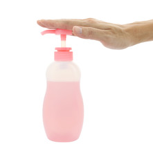 Hand push bottle pump on white background.