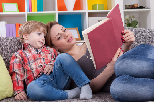 Mother Telling A Story To Child