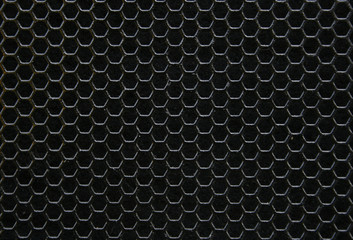 Black iron hexagonal texture. Industrial background