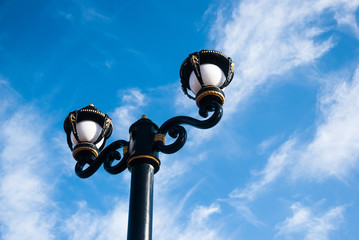 Lamp along the road in Thailand with blue sky background