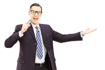 Male announcer holding microphone