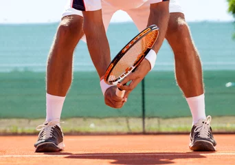 Zelfklevend Fotobehang Tennis player in action © luckybusiness