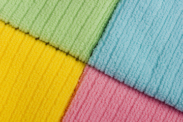 Four colored terry towels
