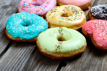 Donuts on a wooden background