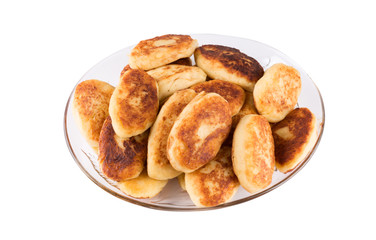 potato patties in a glass dish