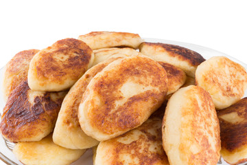 potato patties in a glass dish