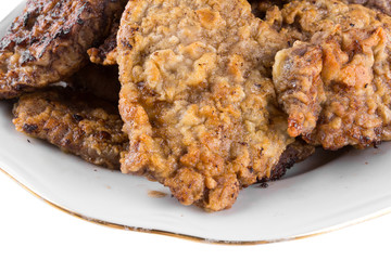 breaded chicken schnitzel on a plate