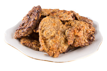 breaded chicken schnitzel on a plate