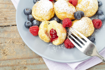 Traditional danish pancakes - ebelskivers with fresh berries