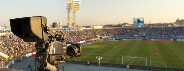 TV at the soccer. video camera back football goal