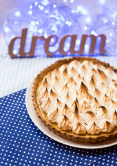 pie on a blue tablecloth background