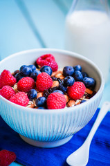 Granola with berries and almonds in a bowl
