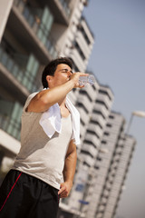 Fototapeta premium Tired athlete refreshing