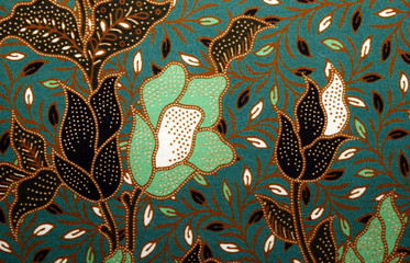 Fabric with floral batik pattern - obrazy, fototapety, plakaty