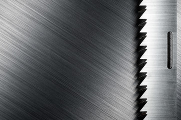 saw edge on brushed metal