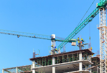 Construction Site with worker on blue sky